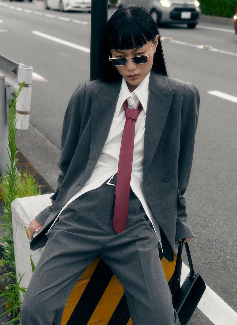 Flared jacket with voluminous sleeves
