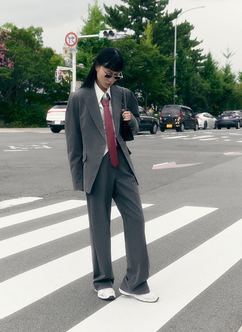 Flared jacket with voluminous sleeves