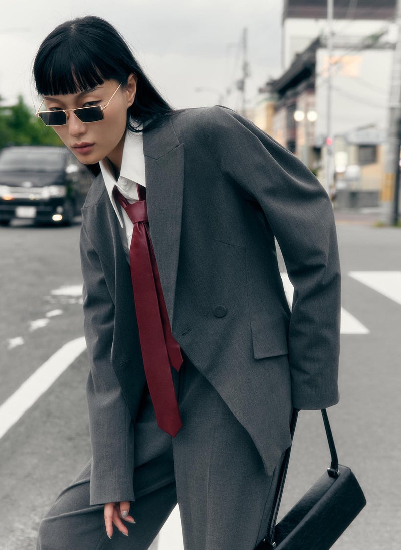 Flared jacket with voluminous sleeves