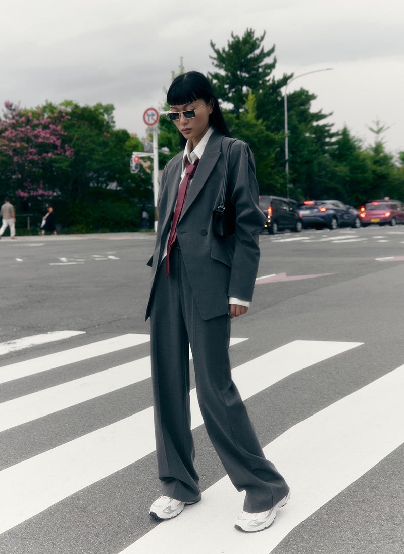 Flared jacket with voluminous sleeves