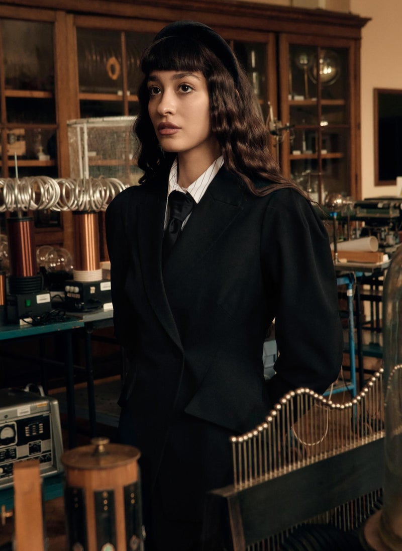 Flared jacket with voluminous sleeves