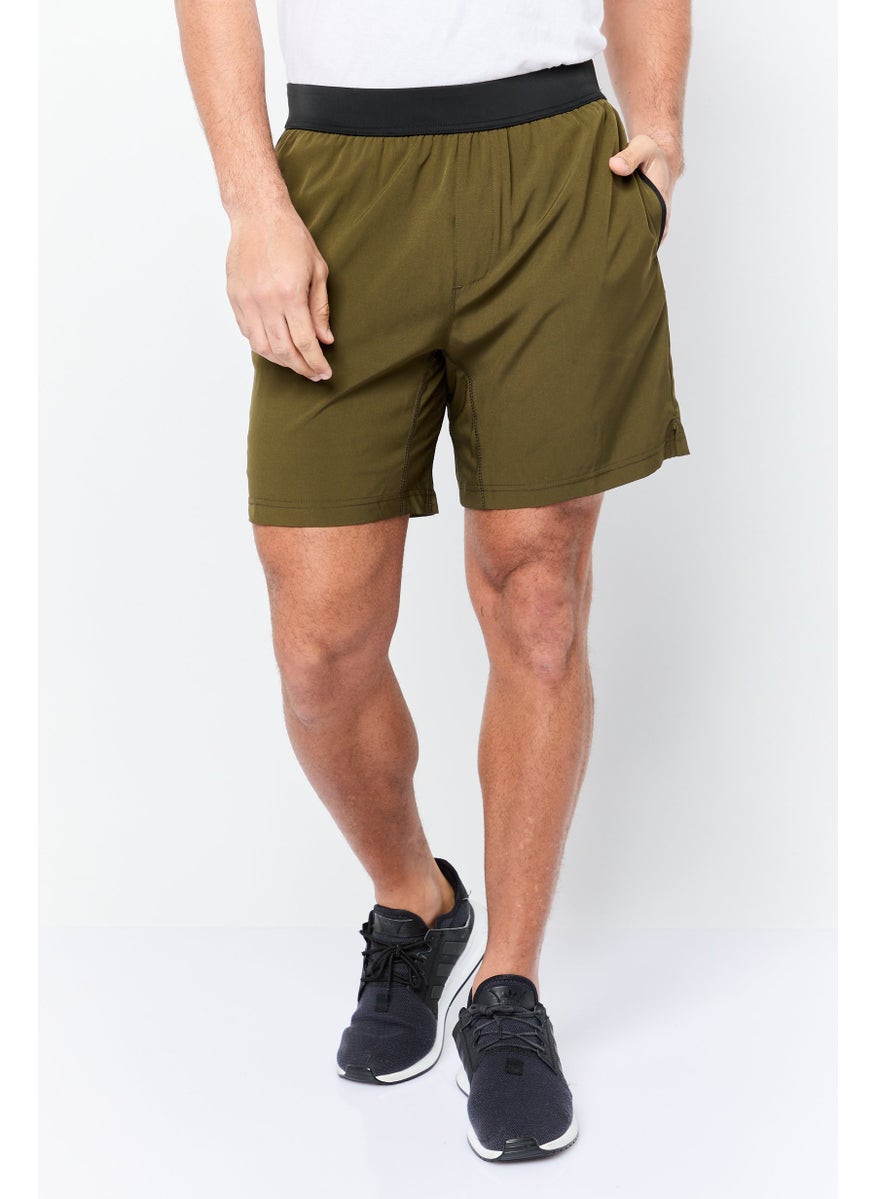 Men Sportswear Fit 7 Inseam Training Shorts, Dark Olive