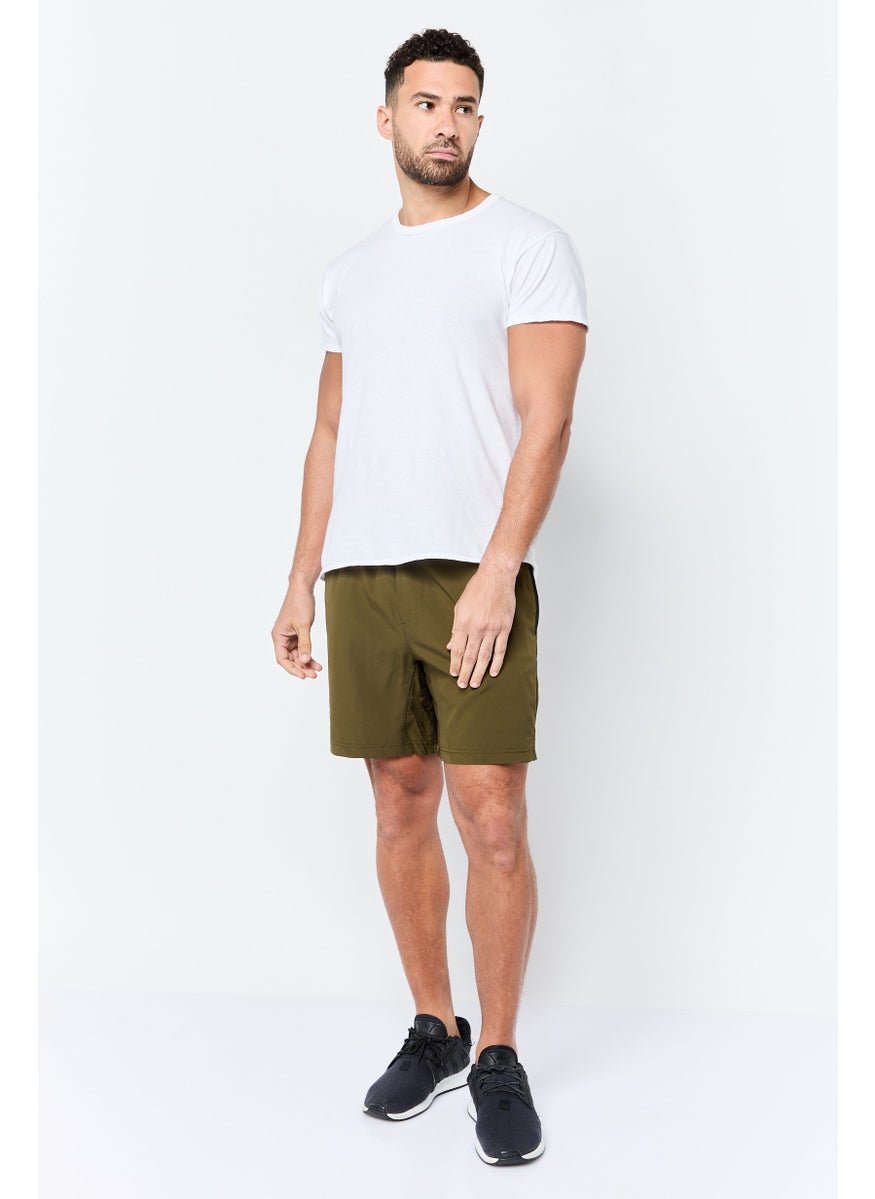 Men Sportswear Fit 7 Inseam Training Shorts, Dark Olive