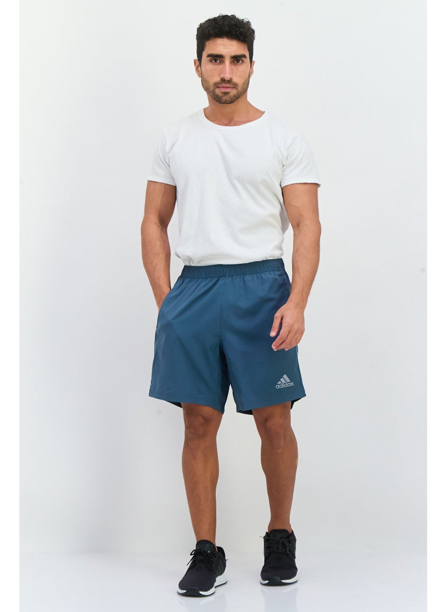 Men Sportswear Fit 7 Inseam Running Shorts, Teal Blue