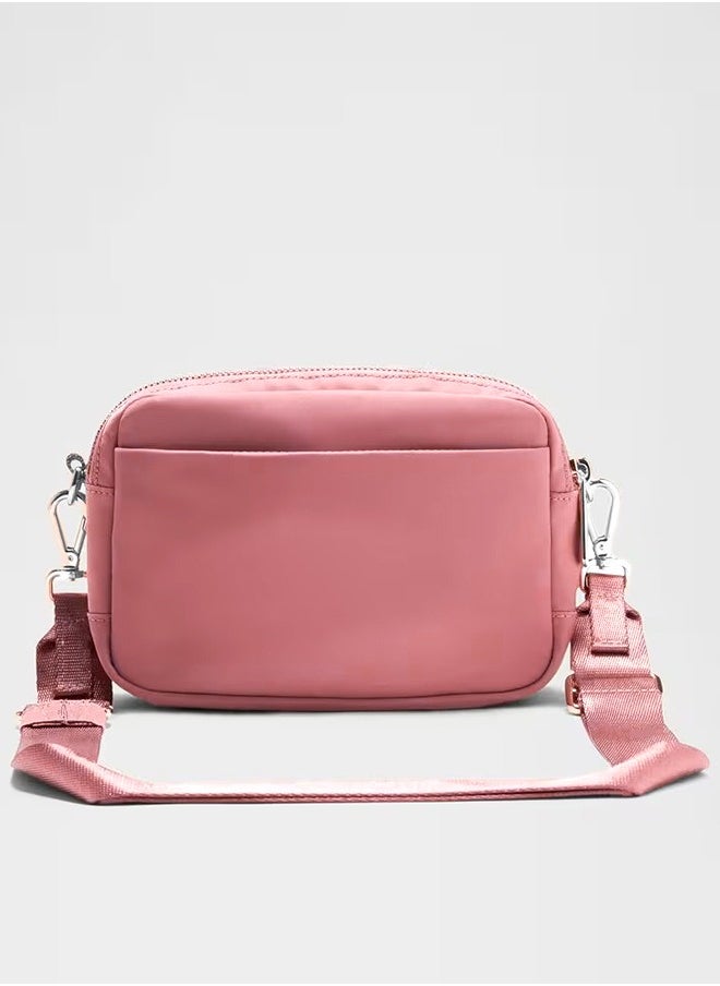 Everywhere Crossbody Bag – Compact and Convenient Belly Bag with Zippered Pockets, Easy-Access Exterior Pocket, and Interior Essentials Pocket for On-the-Go Storage, Pink