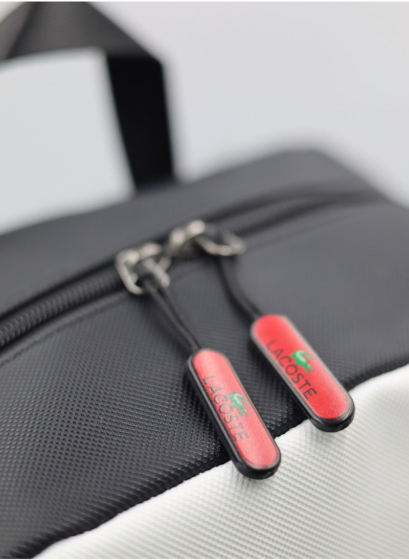 Lacoste Black and white color block backpack