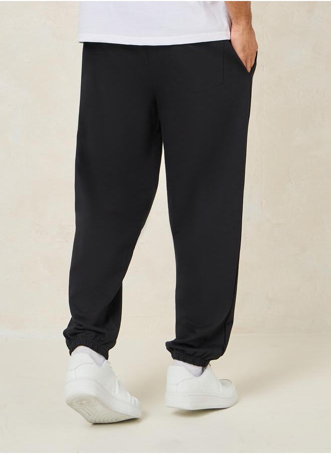 Relaxed Fit Cotton Terry Joggers with Bottom Hem Print