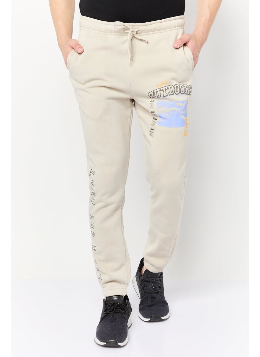 Men Regular Fit Graphic Print Jogger Pants, Beige