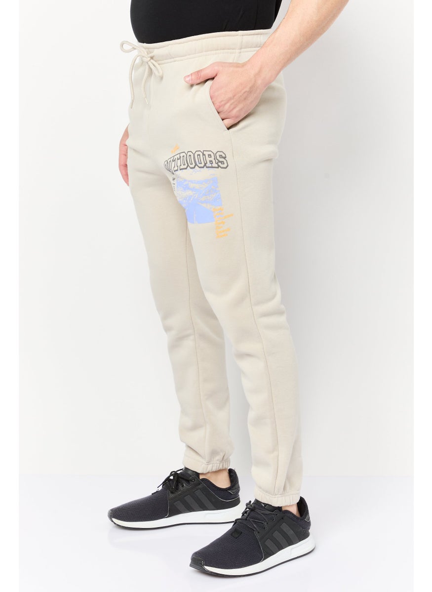 Men Regular Fit Graphic Print Jogger Pants, Beige