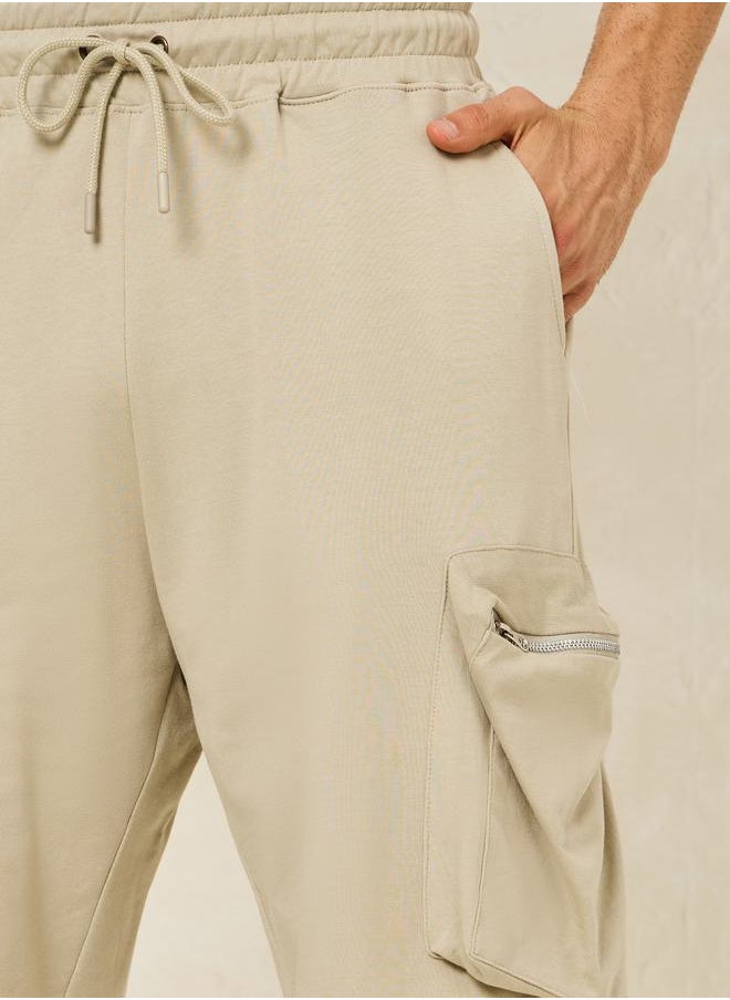 Solid Oversized Shorts with Cargo Pocket Detail