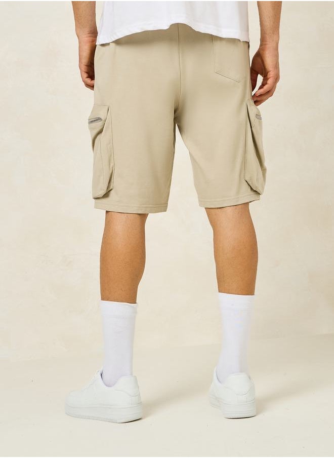 Solid Oversized Shorts with Cargo Pocket Detail