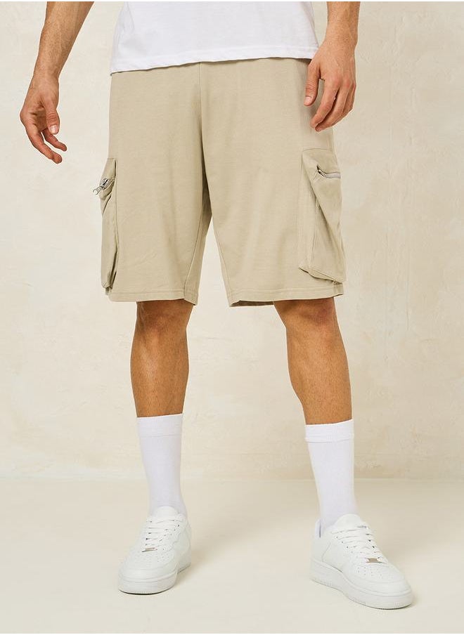 Solid Oversized Shorts with Cargo Pocket Detail