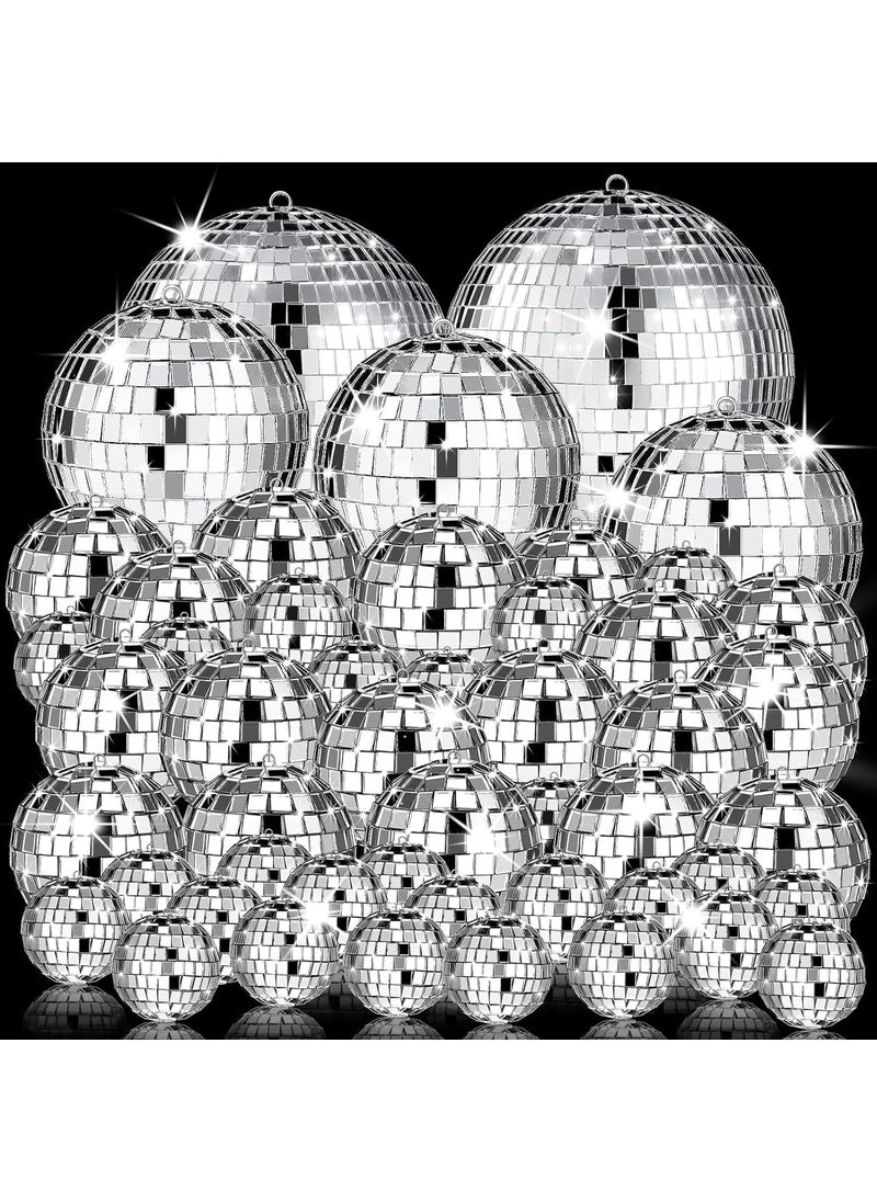 The Decor Affair Set of 54 Silver Disco Ball Decor Ornaments Featuring Miniature Mirrored Delights with Extended Strings for Effortless Hanging Perfect for 70s Disco Themed Parties