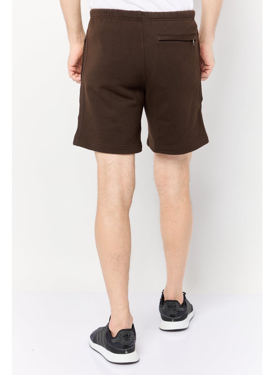 Men Sportswear Fit Brand Logo Training Shorts, Brown