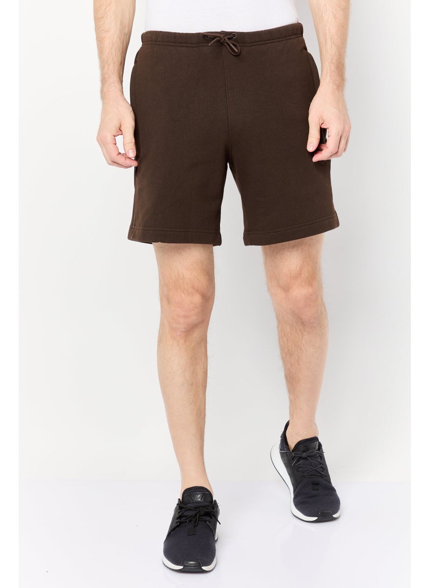 Men Sportswear Fit Brand Logo Training Shorts, Brown