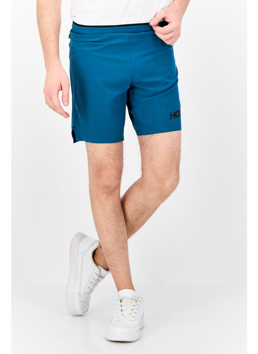 Men Sportswear Fit 7 Inseam Brand Logo Outdoor Shorts, Teal Blue