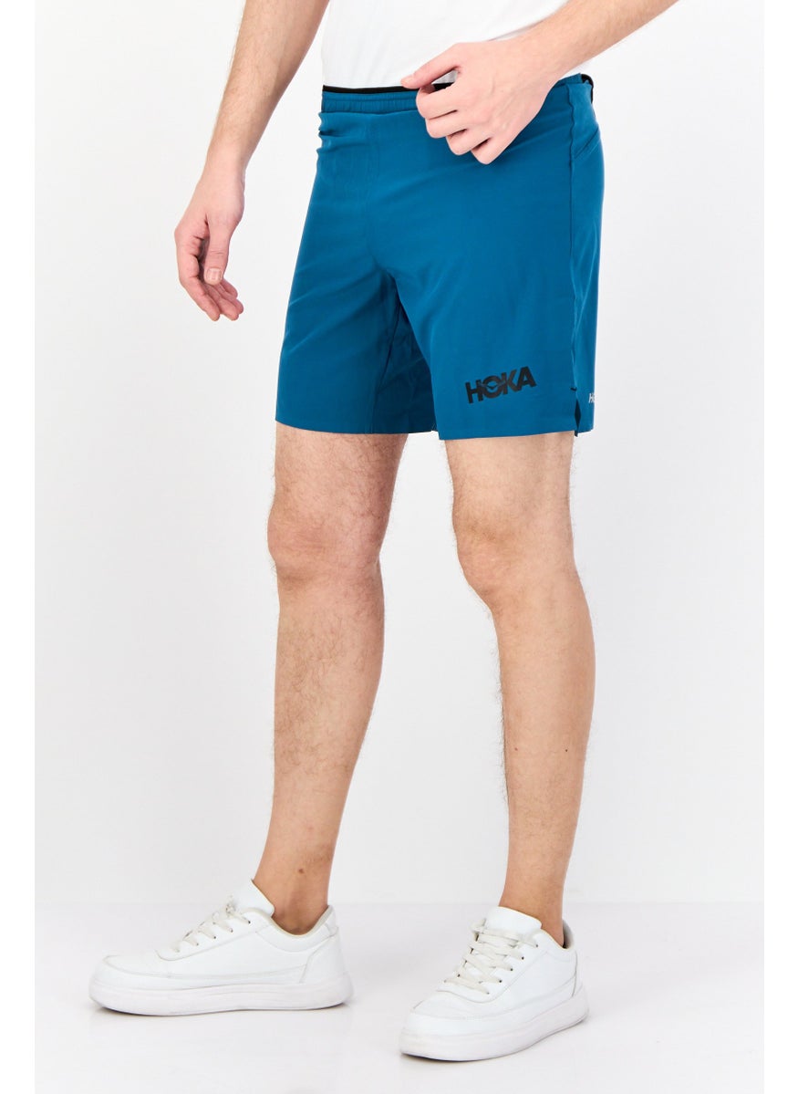 Men Sportswear Fit 7 Inseam Brand Logo Outdoor Shorts, Teal Blue
