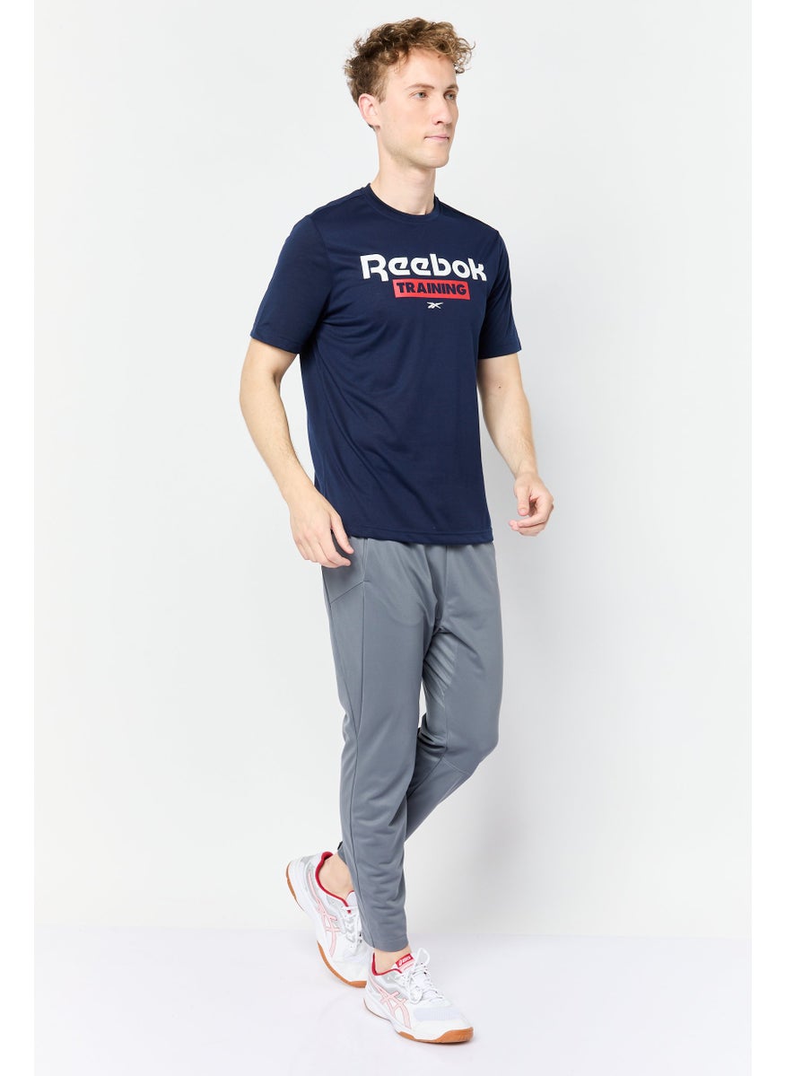 Men Sportswear Fit Brand Logo Short Sleeves Training T-Shirt, Navy