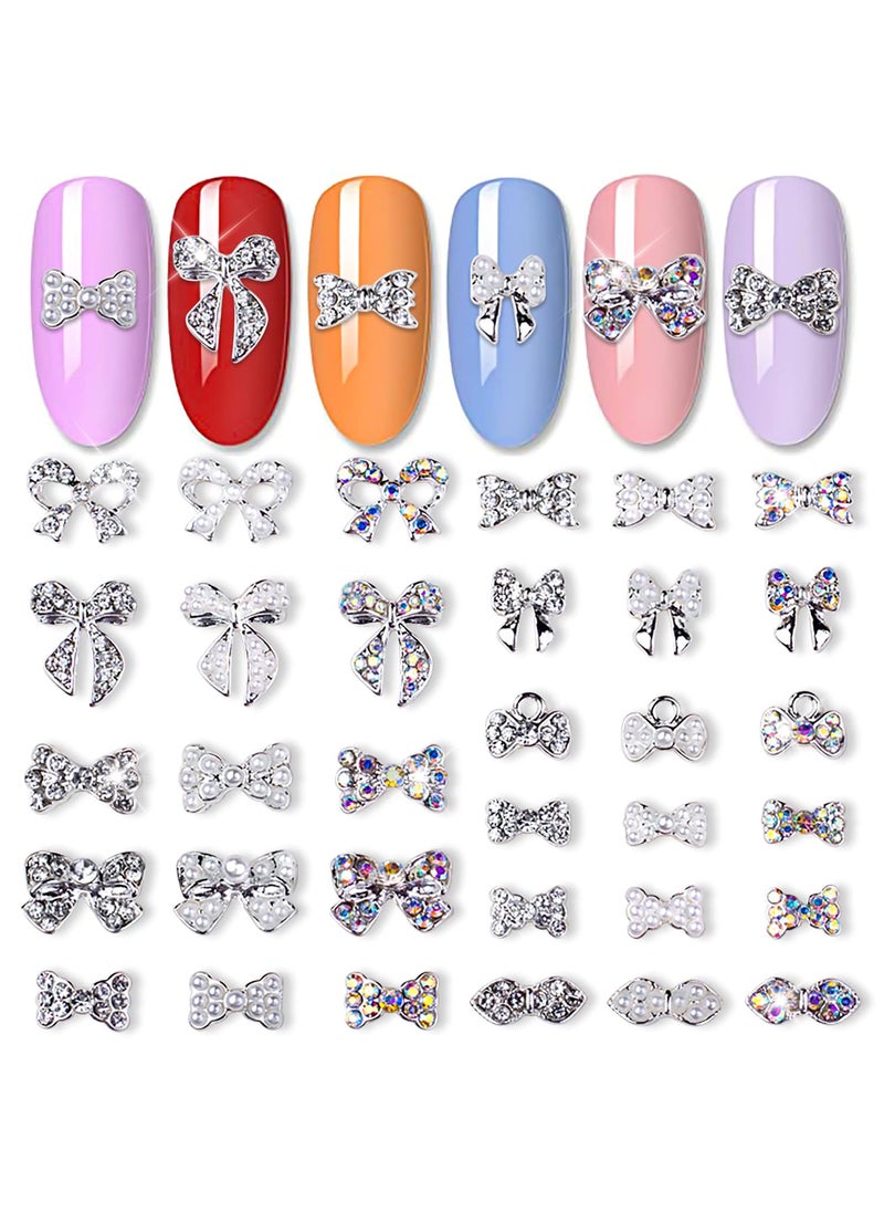 JERCLITY 33 Pieces Silver Alloy Bow Charms for Nails Bow Nail Charms Gems Bowknot Nail Studs Inlaid Pearl Clear Iridescent Rhinestone for Women Nail Art