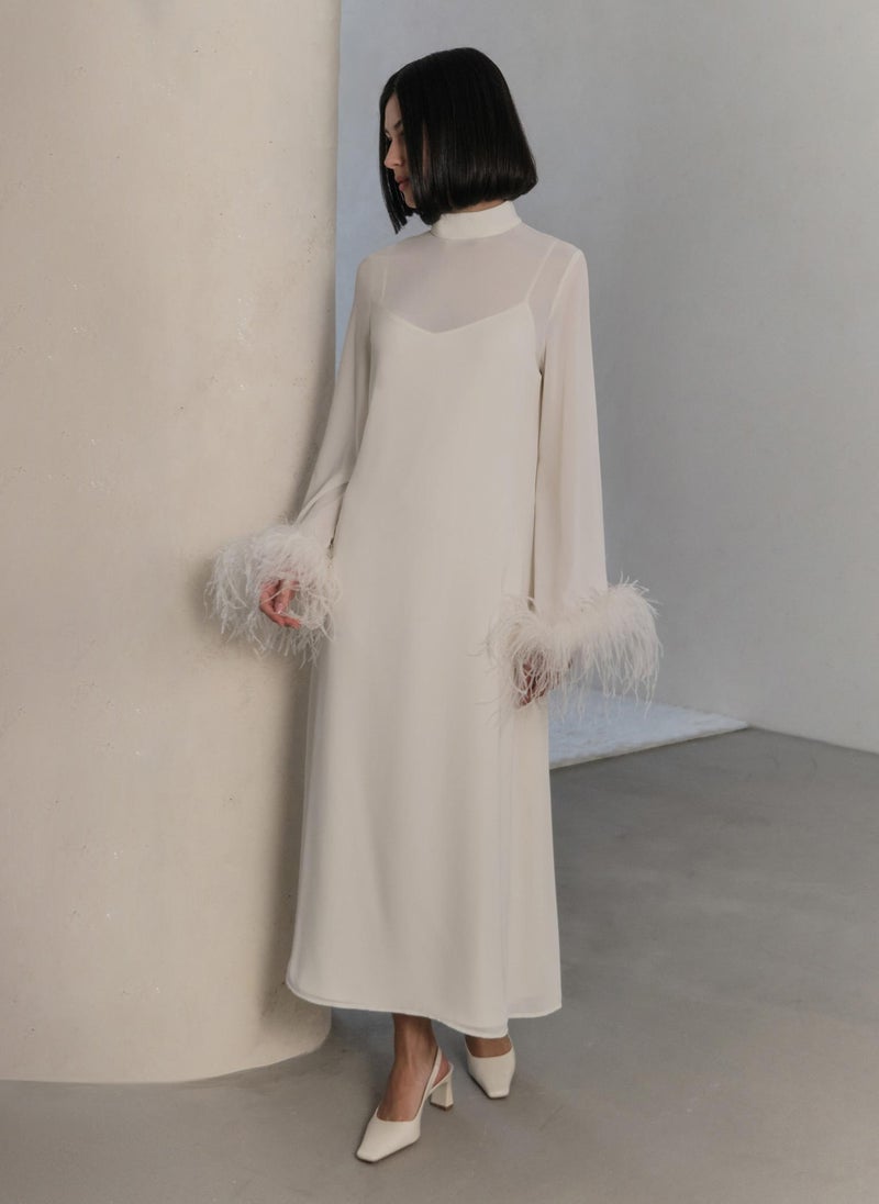 Straight midi dress with feathers on the cuffs
