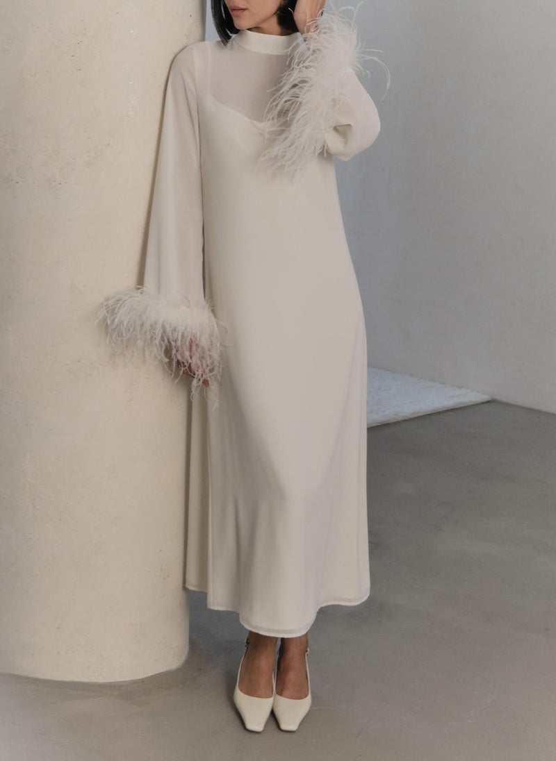 Straight midi dress with feathers on the cuffs
