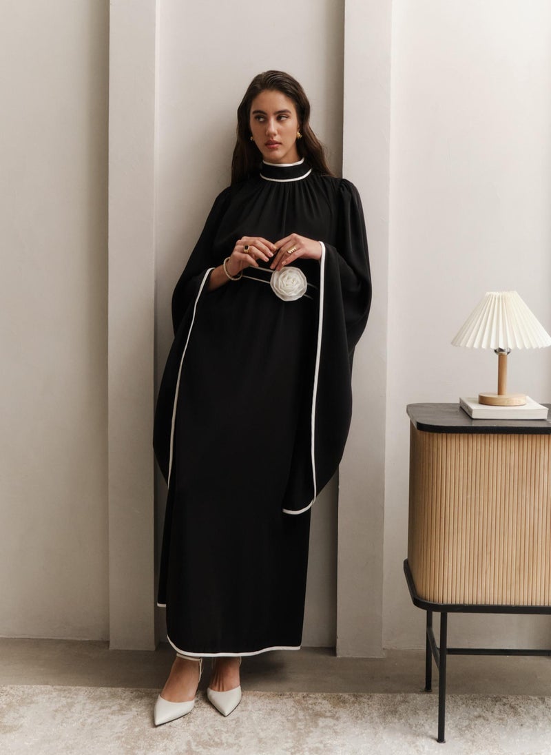 Maxi dress with contrasting edging and waistband flower