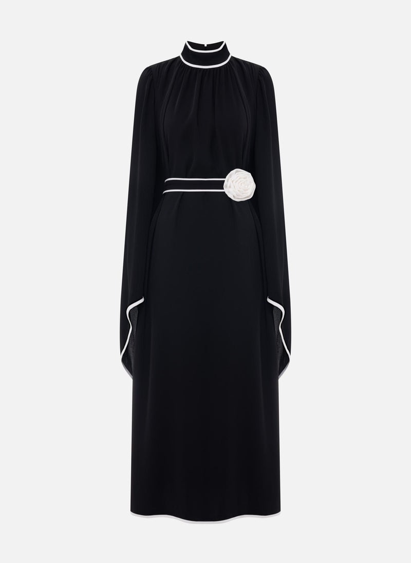 Maxi dress with contrasting edging and waistband flower