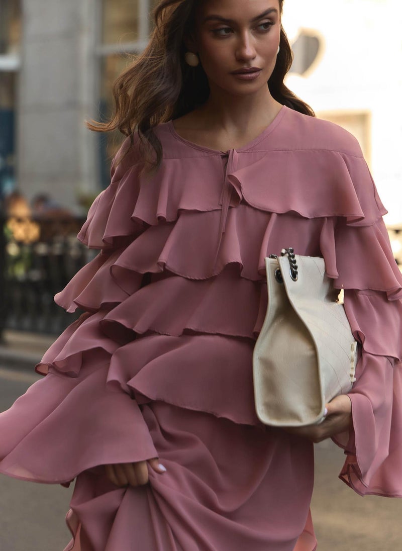 Airy maxi dress with ruffles on the bodice and matching ties