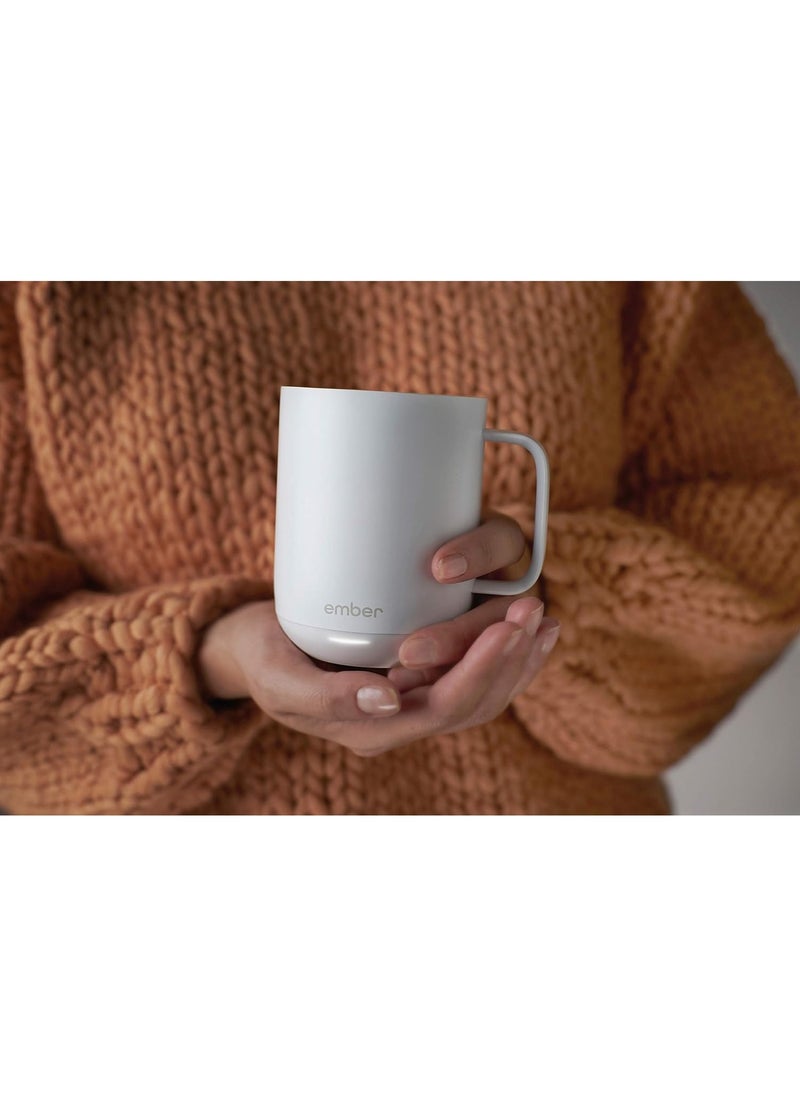 Ember Temperature Control Smart Mug with charging coaster, 10 oz, 1-hr Battery Life, IPX7, customizable led indicator light, App Controlled Heated Coffee Mug, White