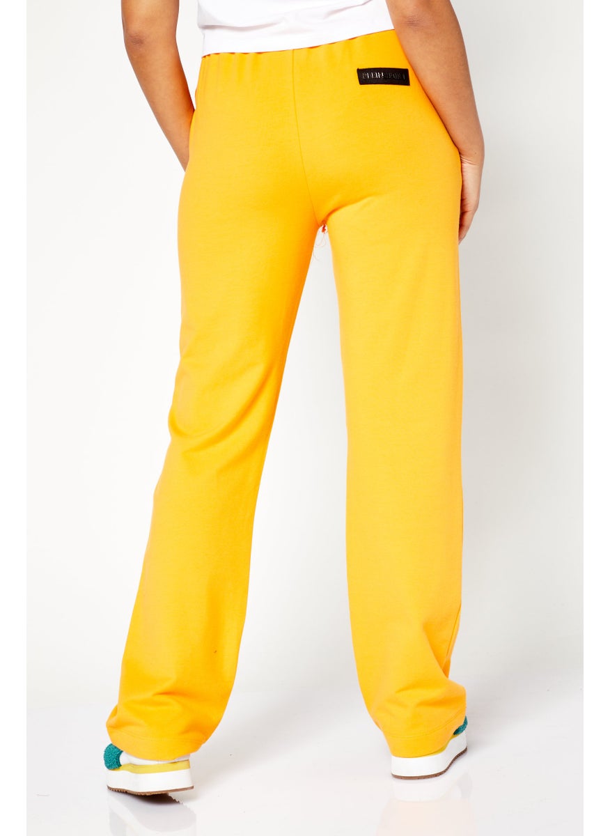 Women Sportswear Fit Training Sweatpants, Orange Combo