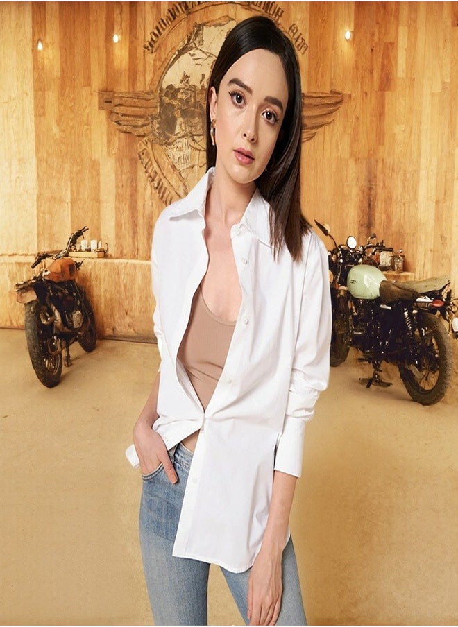 Stay effortlessly stylish with this comfortable White Oversized Shirts Solid design crafted from 100% Cotton featuring Long Sleeves with Button closure.