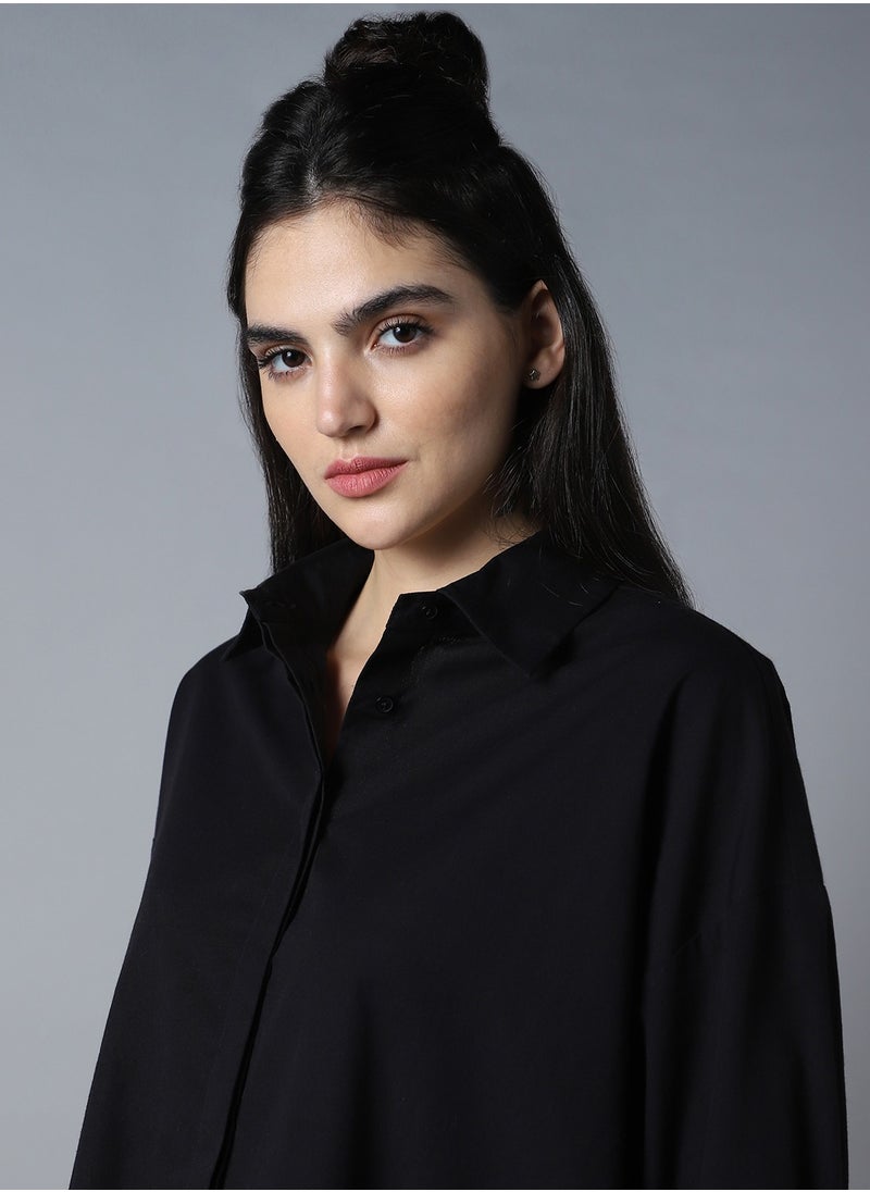 Stay effortlessly stylish with this comfortable Black Oversized Shirts Solid design crafted from 100% Cotton featuring Long Sleeves with Button closure.