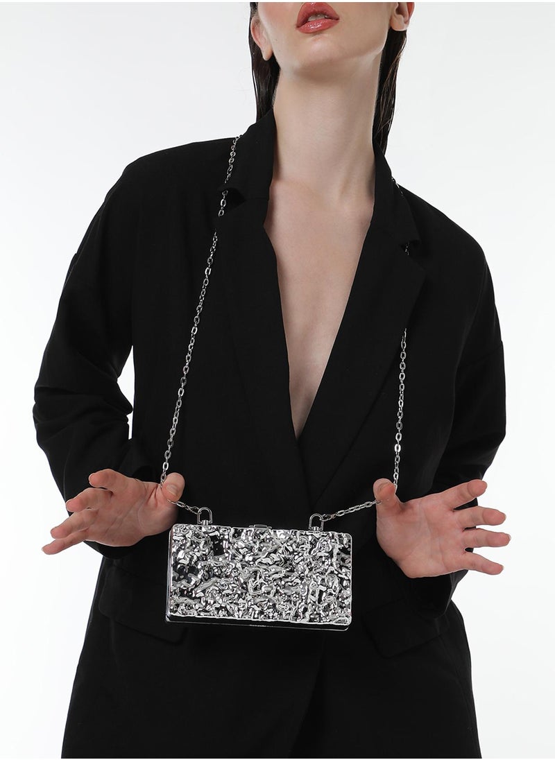 The Dented Chain Clutch Bag