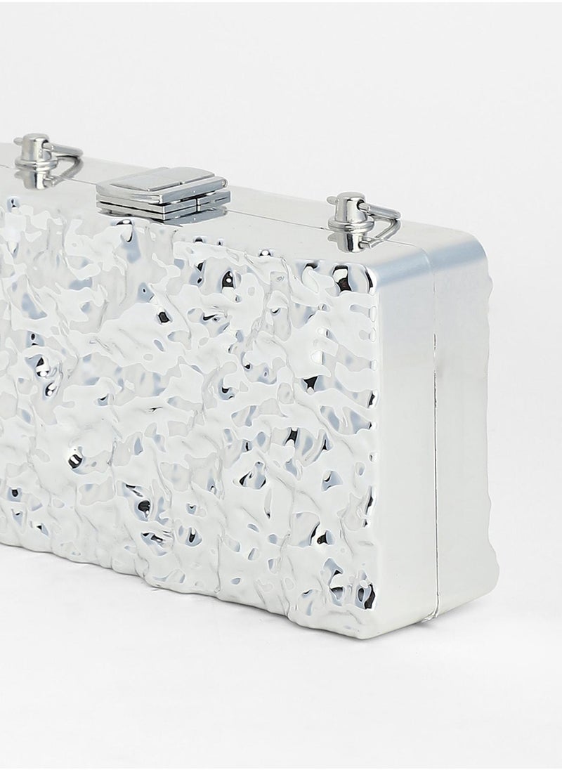 The Dented Chain Clutch Bag