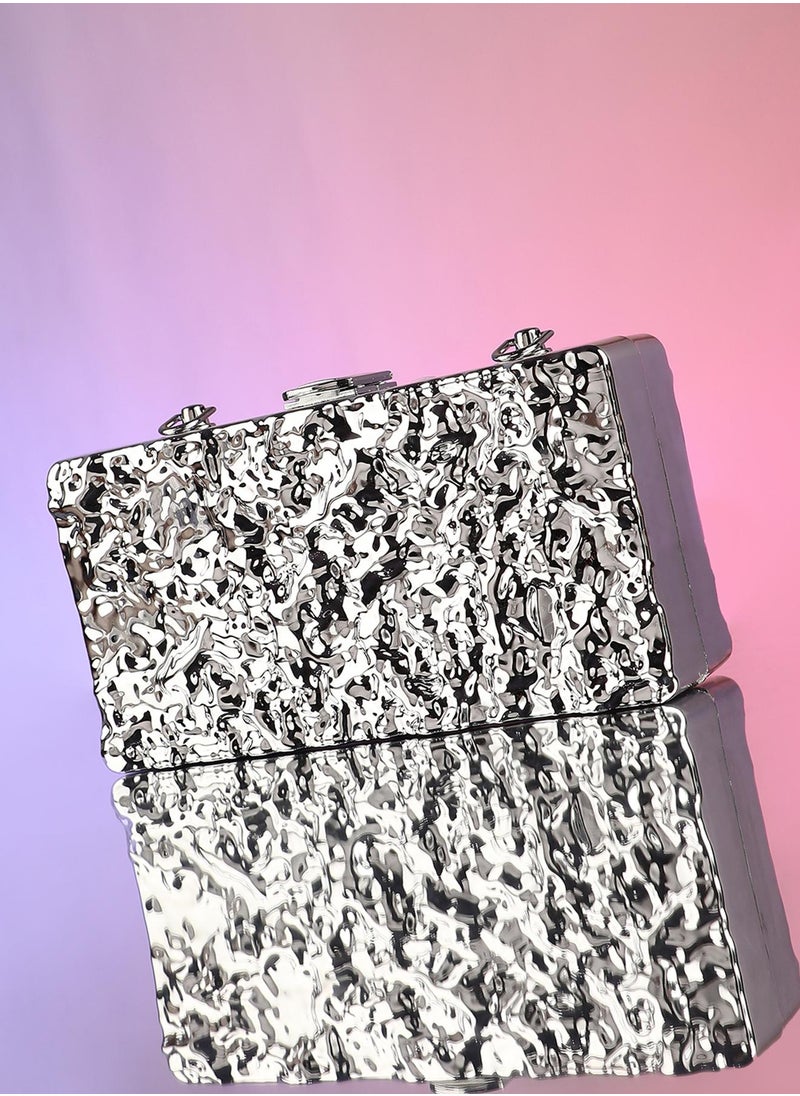 The Dented Chain Clutch Bag