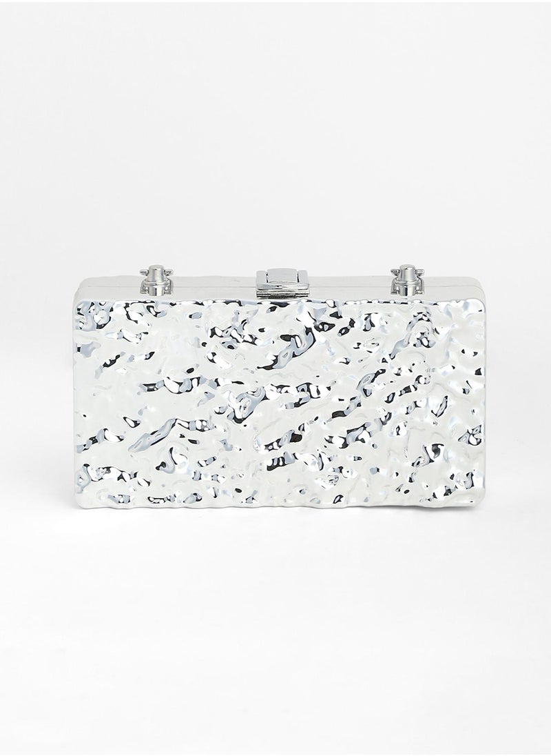 The Dented Chain Clutch Bag