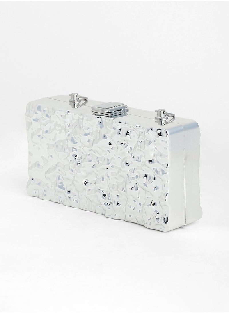 The Dented Chain Clutch Bag
