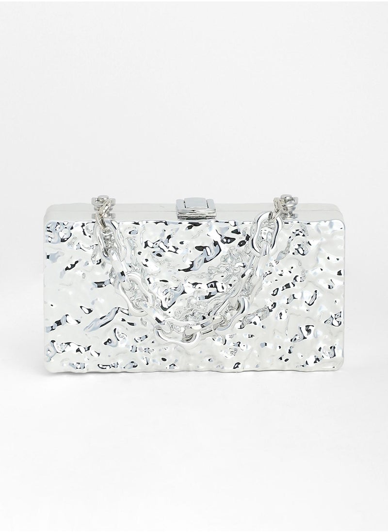 The Dented Chain Clutch Bag