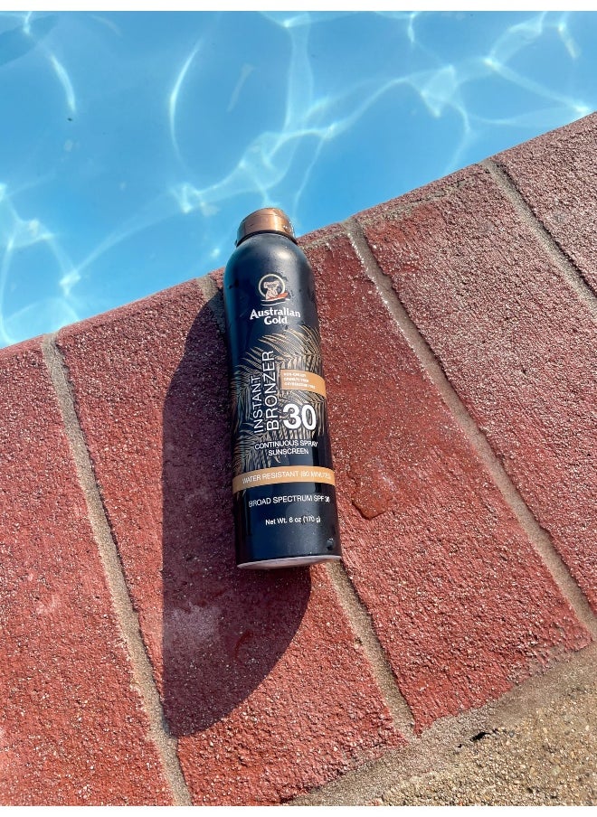 Australian Gold Continuous Spray Sunscreen with Instant Bronzer SPF 30 Immediate Glow Dries Fast Water Resistant NonGreasy Oxybenzone Free Cruelty Free Bronzer New Orange 6 Oz