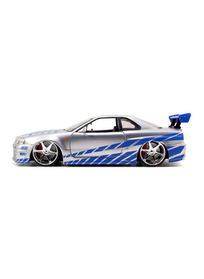 Jada Toys Fast & Furious Brian’s 2002 Nissan Skyline R34 Die-cast Car, 1:24 Scale, Silver & Blue,19808