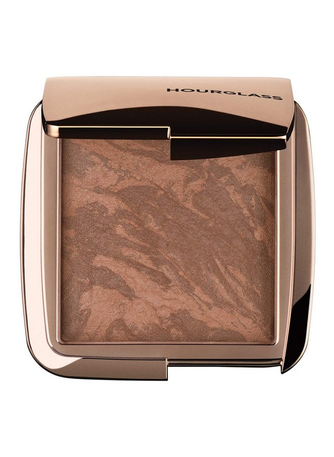 Hourglass Ambient Lighting Bronzer in Radiant Bronze Light. Highlighting Bronzer for a Natural Sun-Kissed Glow. Vegan and Cruelty-Free.