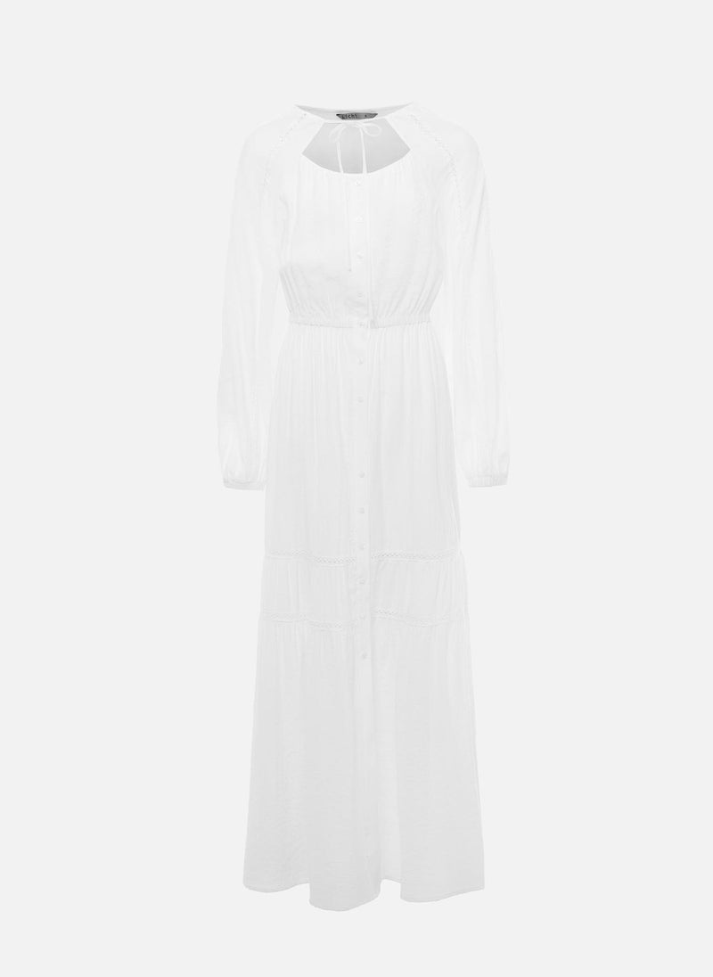 Voluminous maxi dress with collar ties