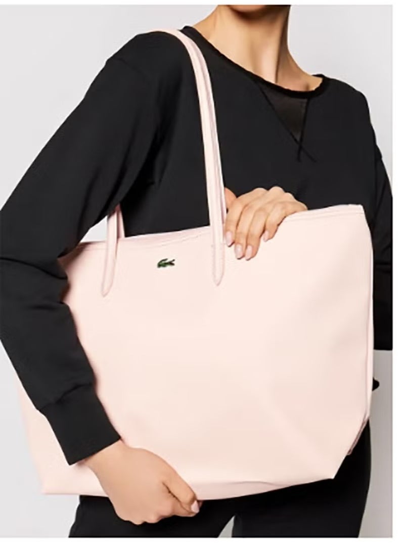 Lacoste's light - pink shoulder bag with a large capacity