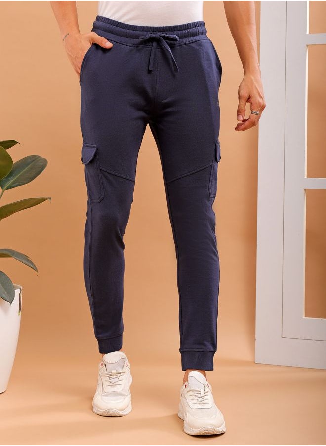 Men Slim Fit Solid Mid-Rise Stretchable Knitted Jogger Trousers