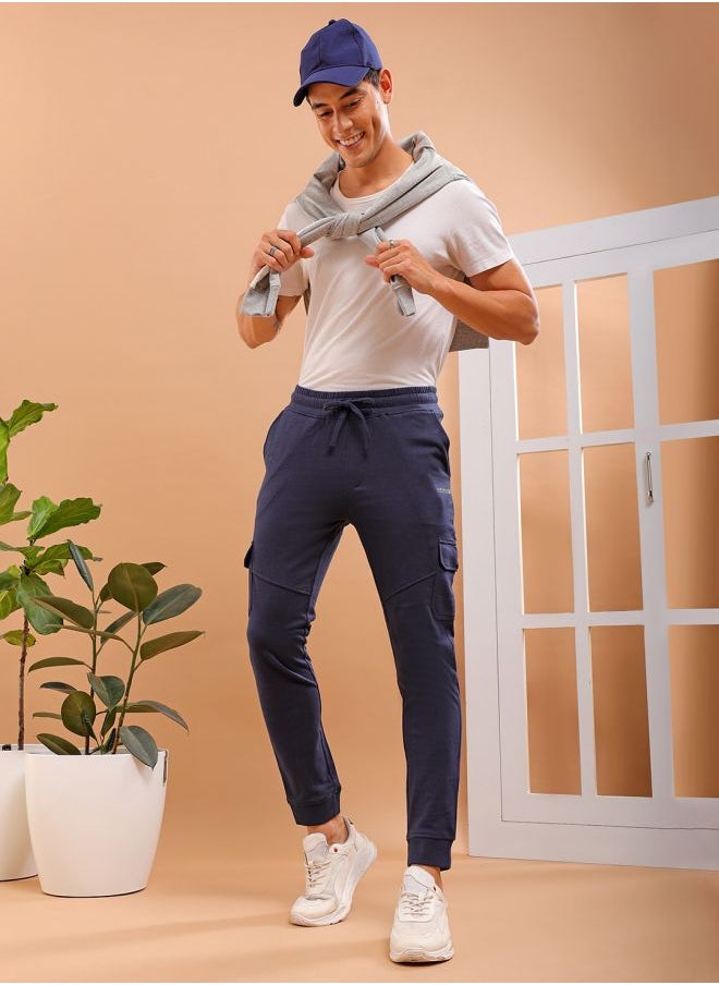 Men Slim Fit Solid Mid-Rise Stretchable Knitted Jogger Trousers