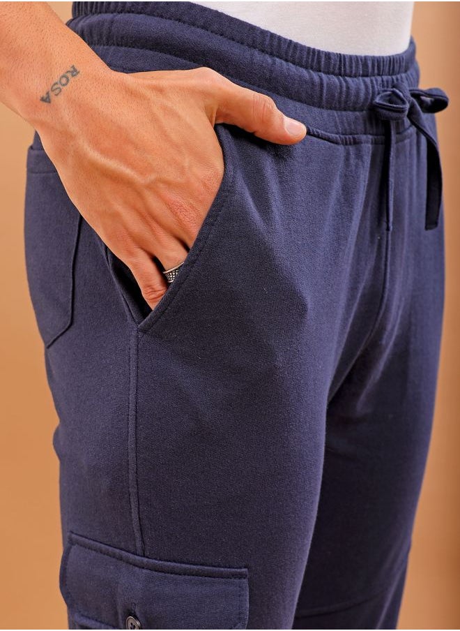 Men Slim Fit Solid Mid-Rise Stretchable Knitted Jogger Trousers