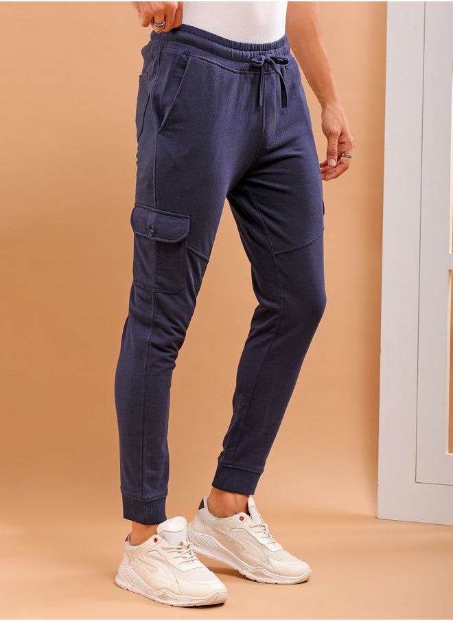 Men Slim Fit Solid Mid-Rise Stretchable Knitted Jogger Trousers