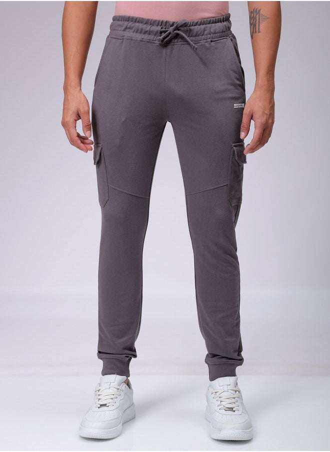 Men Slim Fit Solid Mid-Rise Stretchable Knitted Jogger Trousers