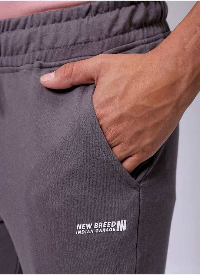 Men Slim Fit Solid Mid-Rise Stretchable Knitted Jogger Trousers