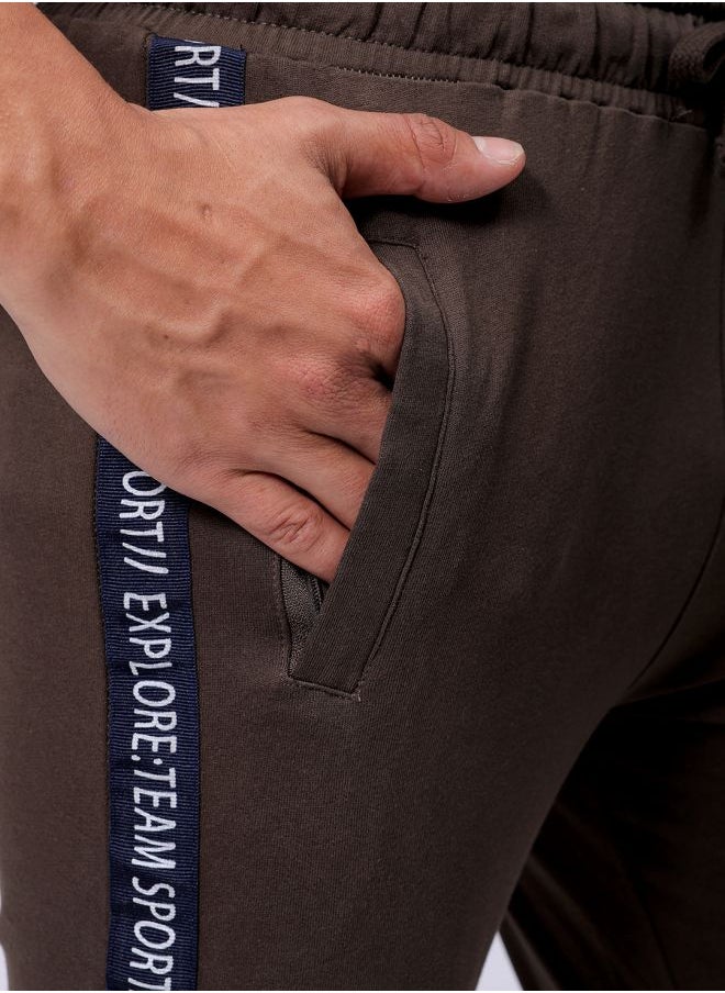 Men Slim Fit Solid Mid-Rise Stretchable Knitted Jogger Trousers
